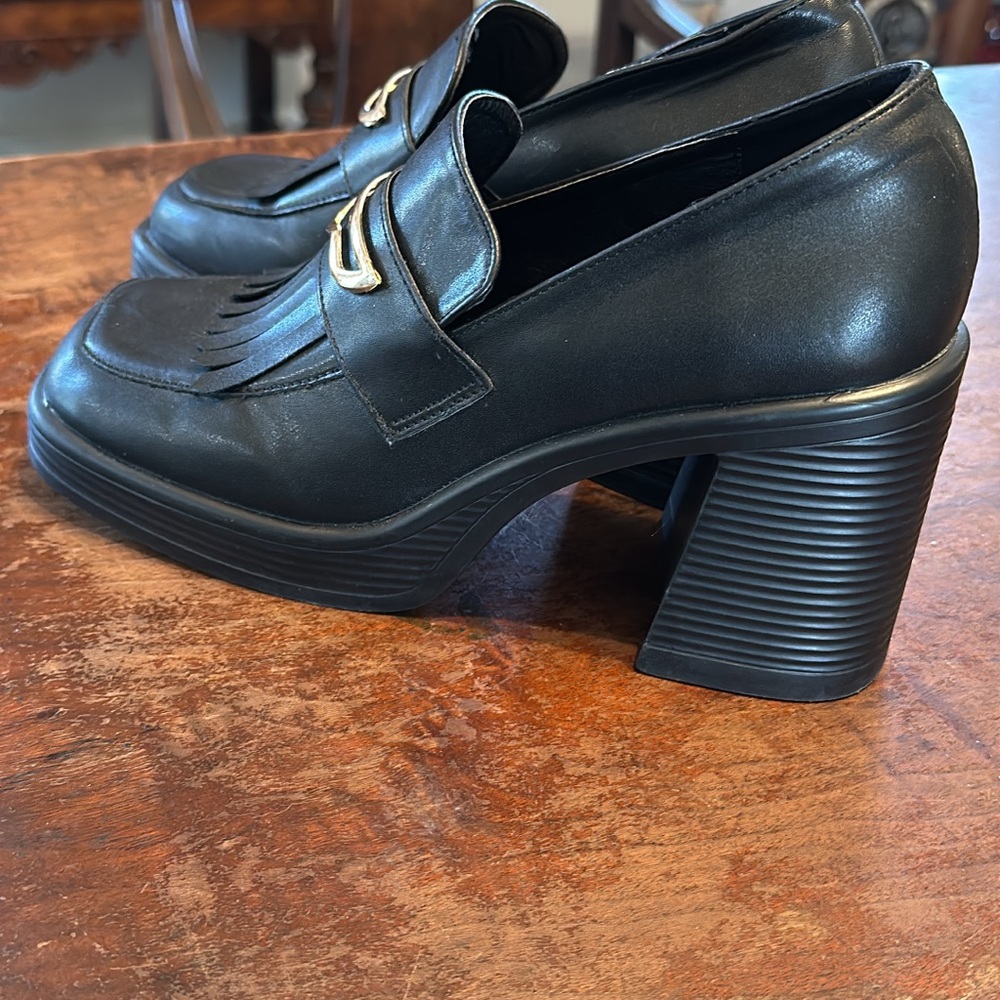 Black loafer style shoes